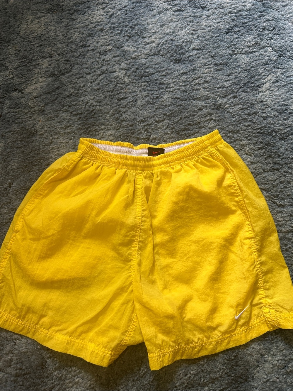 Vintage Nike Women’s Bright Yellow Athletic Shorts with White Swoosh